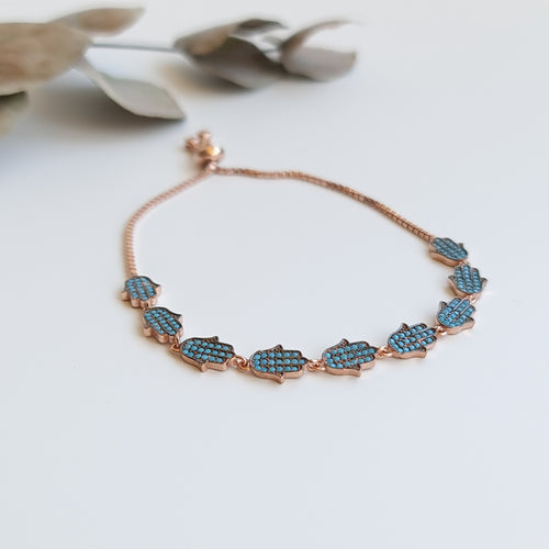 925 sterling silver with 14K gold vermeil and turquoise stone